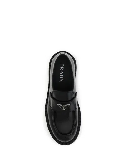 Prada Monolith Leather Loafers In Black