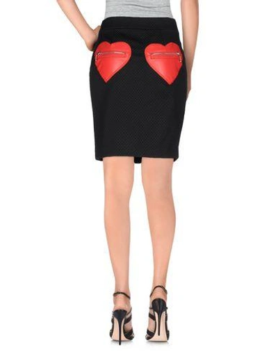 Shop Love Moschino Knee Length Skirt In Black