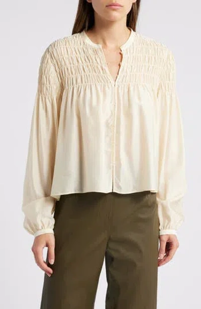 Frame Smocked Collarless Silk-blend Blouse In Gold