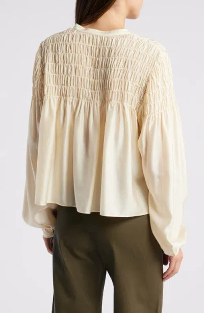 Frame Smocked Collarless Silk-blend Blouse In Gold