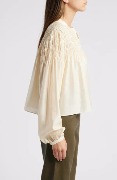 Frame Smocked Collarless Silk-blend Blouse In Gold