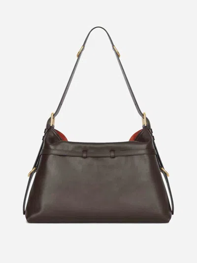Givenchy Medium Voyou Calfskin Shoulder Bag With Buckle Fastening In Brown