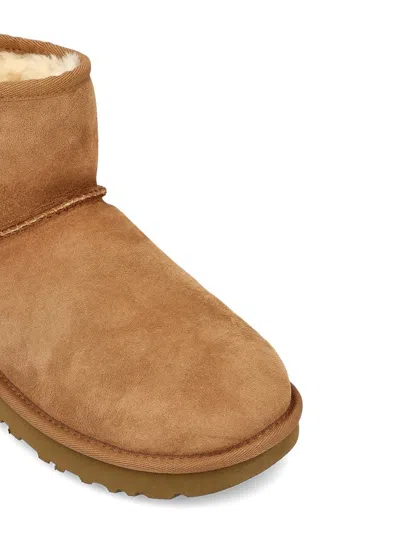 Ugg 10mm Mini Classic Ii Shearling Boots In Brown