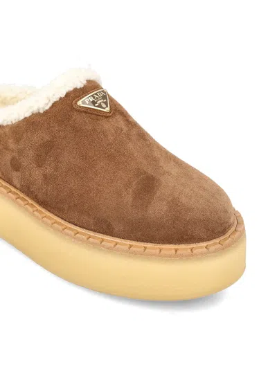 Prada Suede Shearling Cozy Platform Mules In Brown