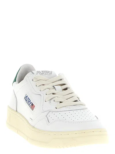 Autry Low-top Leather Sneakers With Perforated Upper And Contrasting Sole In White