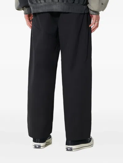 Manastash Zip-pocket Trousers In Black