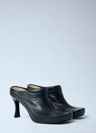 Balenciaga Debossed Logo Heeled Mules In Black