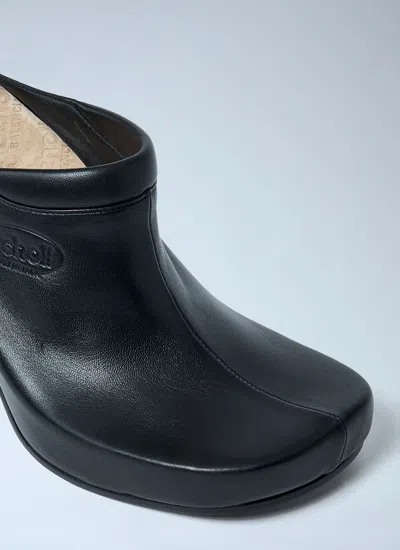 Balenciaga Debossed Logo Heeled Mules In Black