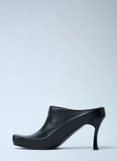 Balenciaga Debossed Logo Heeled Mules In Black