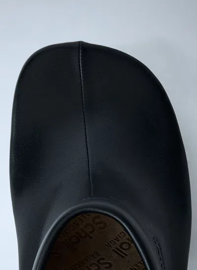 Balenciaga Debossed Logo Heeled Mules In Black
