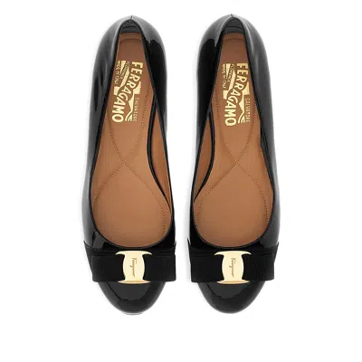 Ferragamo Glossy Leather Ballerinas With Bow Accent In Black