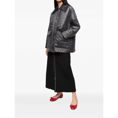Ganni Shiny Black Quilted Midi Jacket With Pointed Collar In Gray