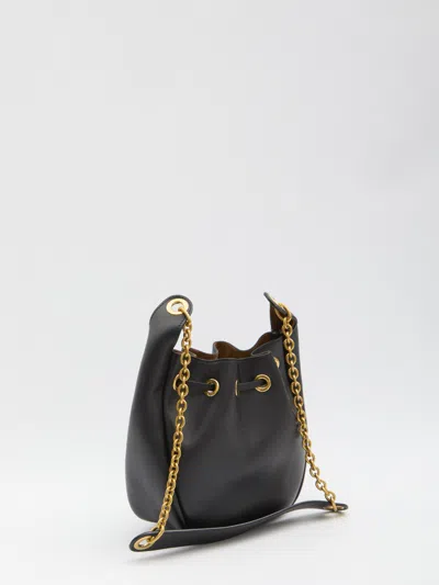 Saint Laurent Cassandre Drawstring Leather Shoulder Bag In Black
