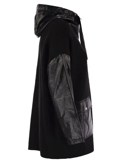 Herno Ribbed Wool Cape With Drawstring Hood And Contrasting Sleeves In Black