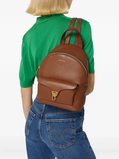 Coccinelle Flap-pocket Zip Backpack In Brown