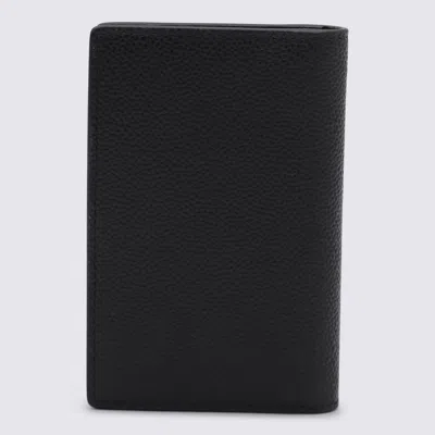 Tod's Textured Finish Wallets For A Sophisticated Look In Black