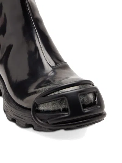 拉链细节椭圆形标牌短靴