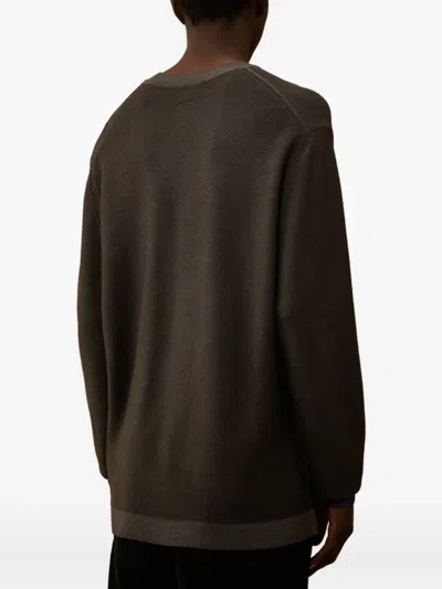 C.p. Company Fine-knit Merino Crewneck Sweater With Patch Pocket Detail In Brown
