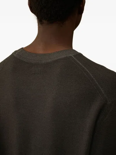C.p. Company Fine-knit Merino Crewneck Sweater With Patch Pocket Detail In Brown