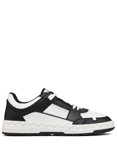 Valentino Garavani 'freedots' White And Black Low Top Sneakers With Studs In Leather Man