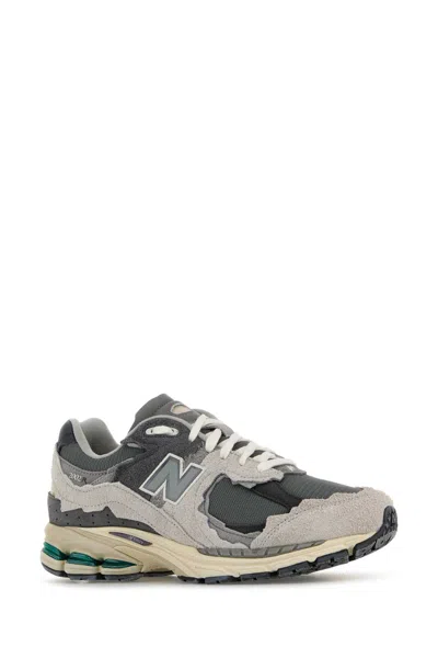 New Balance Layered Mesh And Suede Sneakers With Retro Aesthetic In Gray