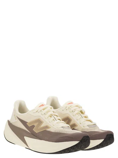 New Balance Fuelcell Rebel V5 Logo-print Sneakers In Neutral