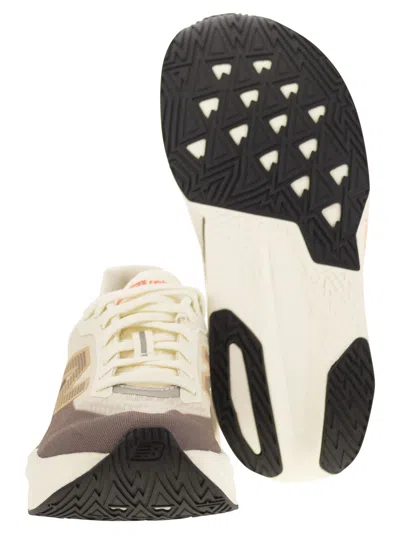 New Balance Fuelcell Rebel V5 Logo-print Sneakers In Neutral