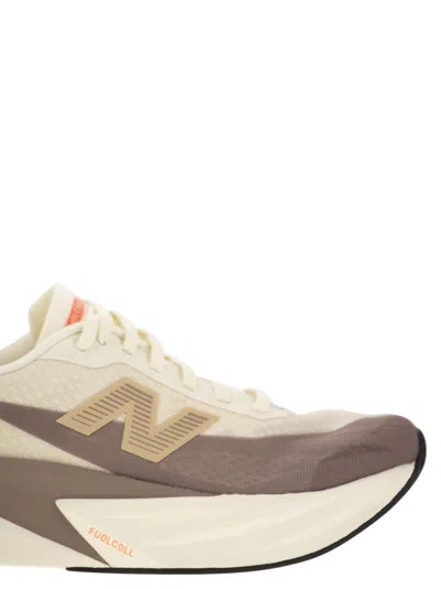 New Balance Fuelcell Rebel V5 Logo-print Sneakers In Neutral