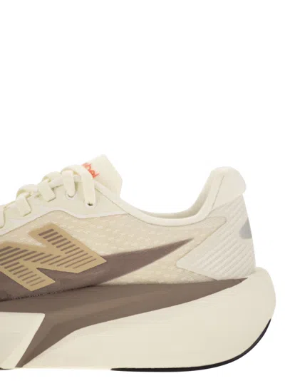 New Balance Fuelcell Rebel V5 Logo-print Sneakers In Neutral