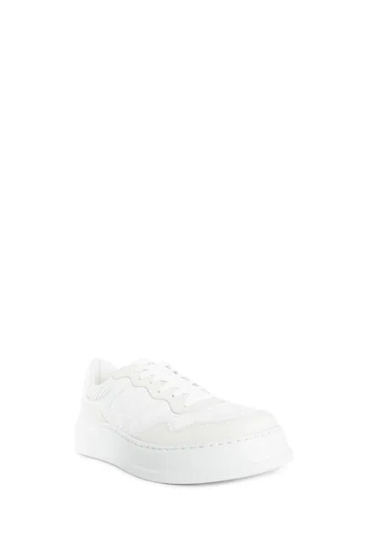 Gucci Gg Embossed Low-top Sneakers In White