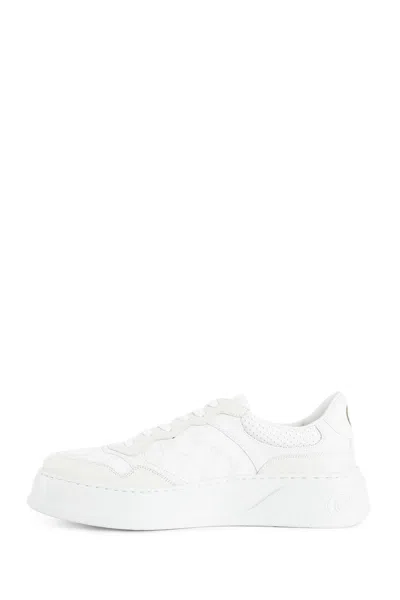 Gucci Gg Embossed Low-top Sneakers In White