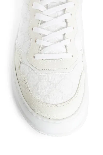 Gucci Gg Embossed Low-top Sneakers In White