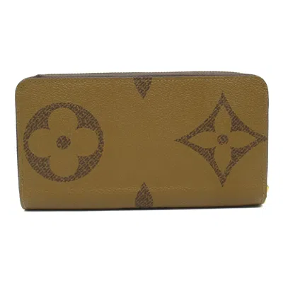 Pre-owned Louis Vuitton Brown Coated Canvas Monogram Pvc Leather Long Wallet (bi-fold) ()