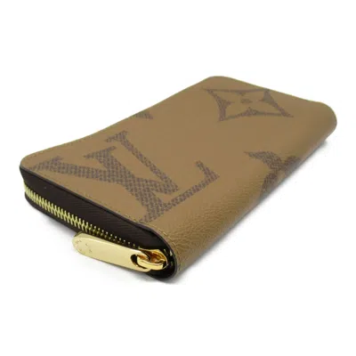 Pre-owned Louis Vuitton Brown Coated Canvas Monogram Pvc Leather Long Wallet (bi-fold) ()