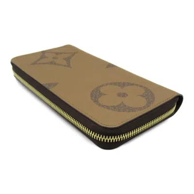 Pre-owned Louis Vuitton Brown Coated Canvas Monogram Pvc Leather Long Wallet (bi-fold) ()