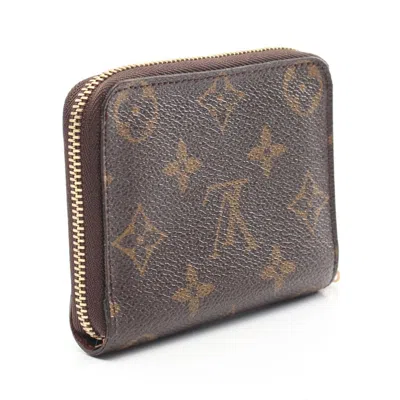 Pre-owned Louis Vuitton Brown Coated Canvas Pvc Monogram Coin Purse/coin Case ()