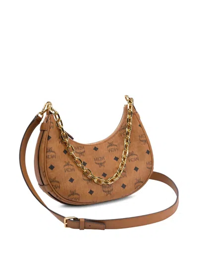 Mcm Woman Printed Canvas Aren Crescent Shoulder Bag In Brown