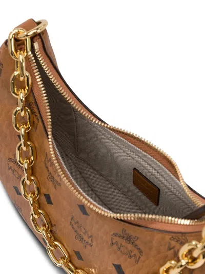 Mcm Woman Printed Canvas Aren Crescent Shoulder Bag In Brown