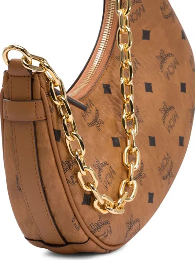 Mcm Woman Printed Canvas Aren Crescent Shoulder Bag In Brown