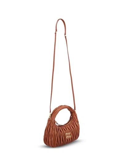 Miu Miu Matelasse Quilted Top Handle Hobo Bag In Brown