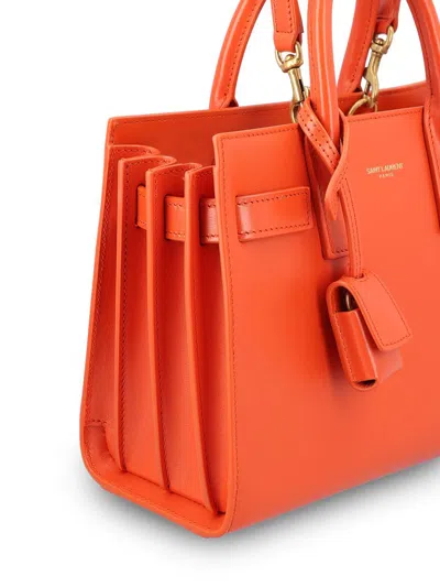 Saint Laurent Sac De Jour Nano Top-handle Bag In Smooth Leather In Orange