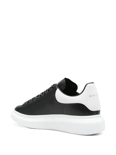 Alexander Mcqueen Black Low Top Sneakers With Chunky Sole And Contrasting Heel In Leather Man In Black