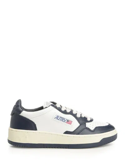 Autry Low-top Leather Sneakers With Navy Overlays And Perforated Details In Black