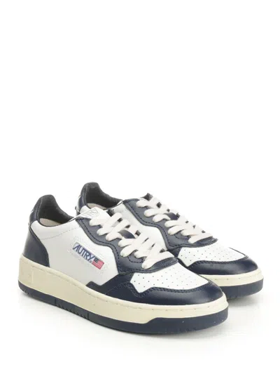 Autry Low-top Leather Sneakers With Navy Overlays And Perforated Details In Black