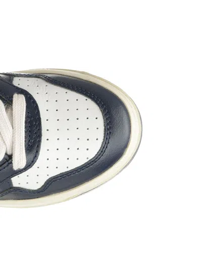 Autry Low-top Leather Sneakers With Navy Overlays And Perforated Details In Black