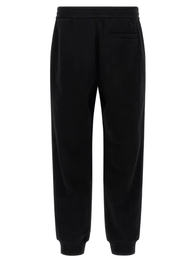 Versace Elastic Waistband Joggers With Ribbed Cuffs In Black