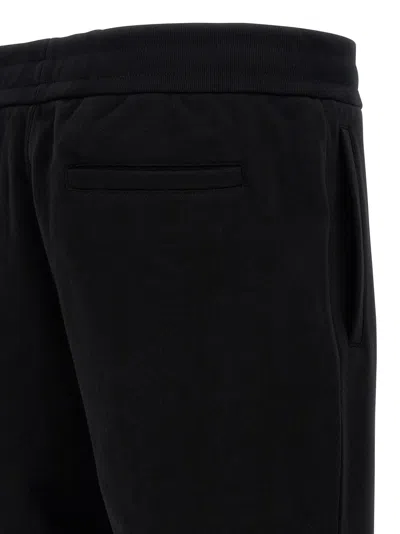 Versace Elastic Waistband Joggers With Ribbed Cuffs In Black