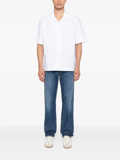 Givenchy Straight-leg Denim Jeans With Faded Blue Wash And Embroidered Branding In Blue