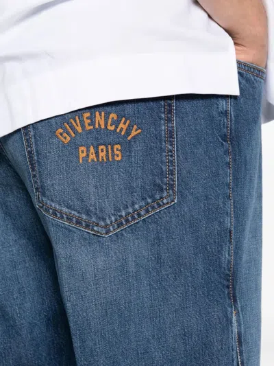 Givenchy Straight-leg Denim Jeans With Faded Blue Wash And Embroidered Branding In Blue