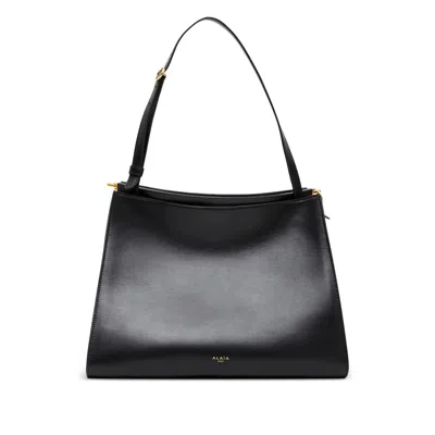 Alaïa Le Click Medium Curve Shoulder Bag In Glossy Leather In Black